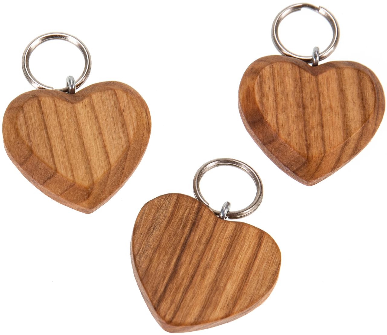 Flacher Holz Schluesselanhaenger aus geoelter Kirsche Herzform