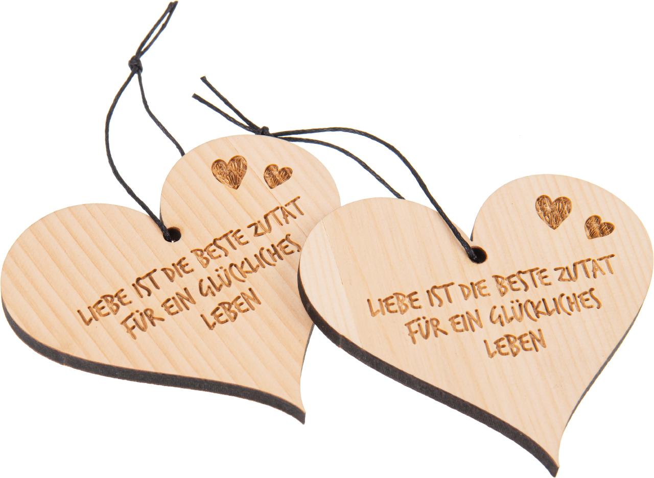 Herz mit Band Zirbe lasergeschnitten Gravur: Liebe ist die beste Zutat fuer ein glueckliches Leben