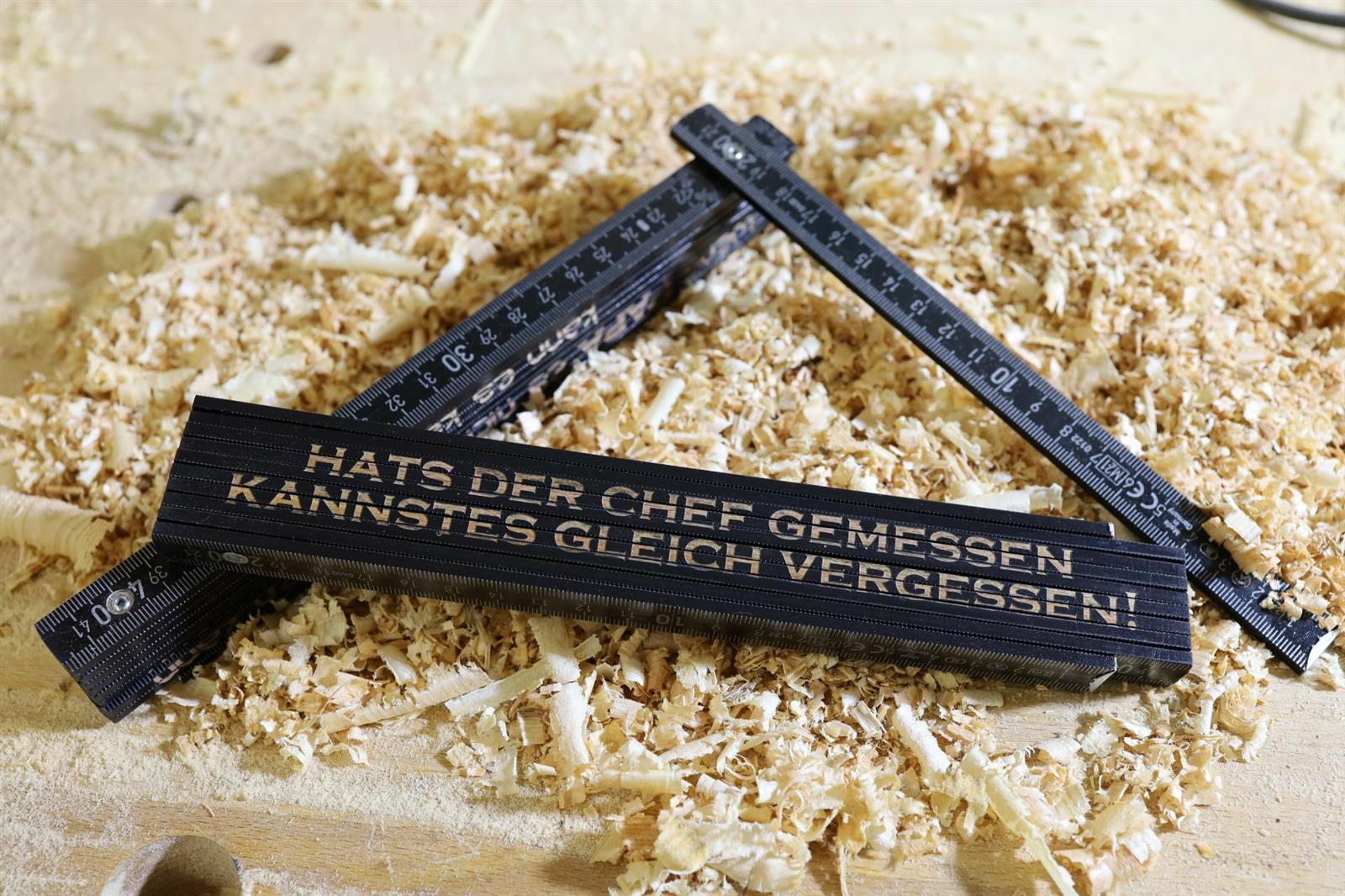 Hats der Chef gemessen Zollstock Schwarzer Meterstab