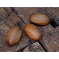 Wooden hand flatterer in stone shape made of oiled cherry...