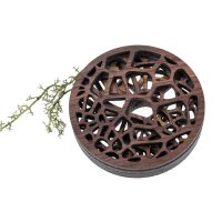 Wooden coaster in organic honeycomb shape made of